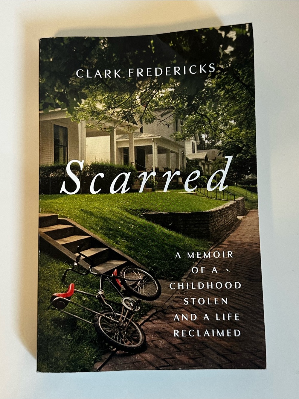 Clark Fredericks
Scarred: A Memoir of a Childhood Stolen and a Life Reclaimed